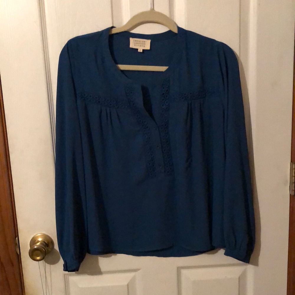 A blouse v-neck with trim on the front